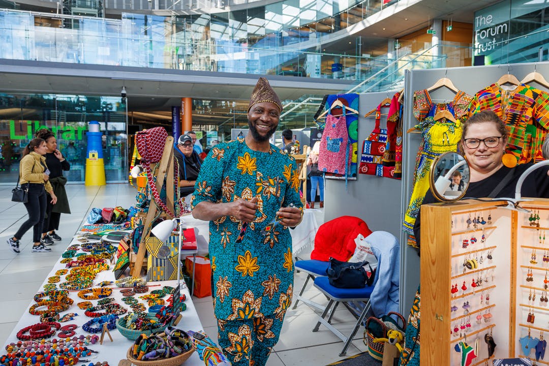 Stall holder at the African & Caribbean Market at The Firym