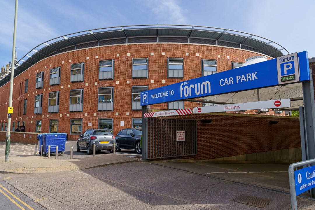 Entrance to The Forum's underground car park on Bethel Street Norwich with blue sign including a parking symbol.