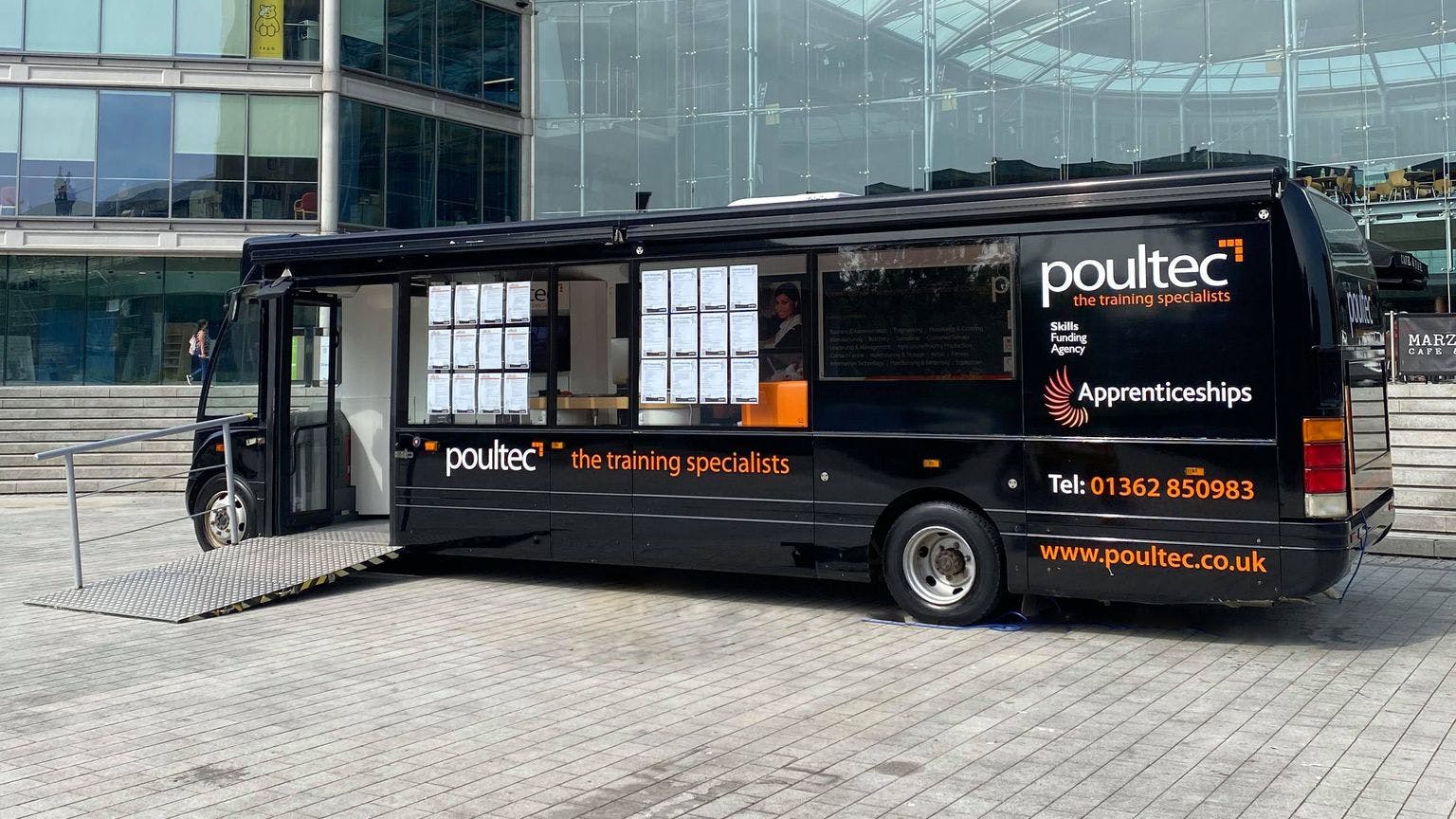 A picture of the Poultec Training bus outside The Forum, Norwich