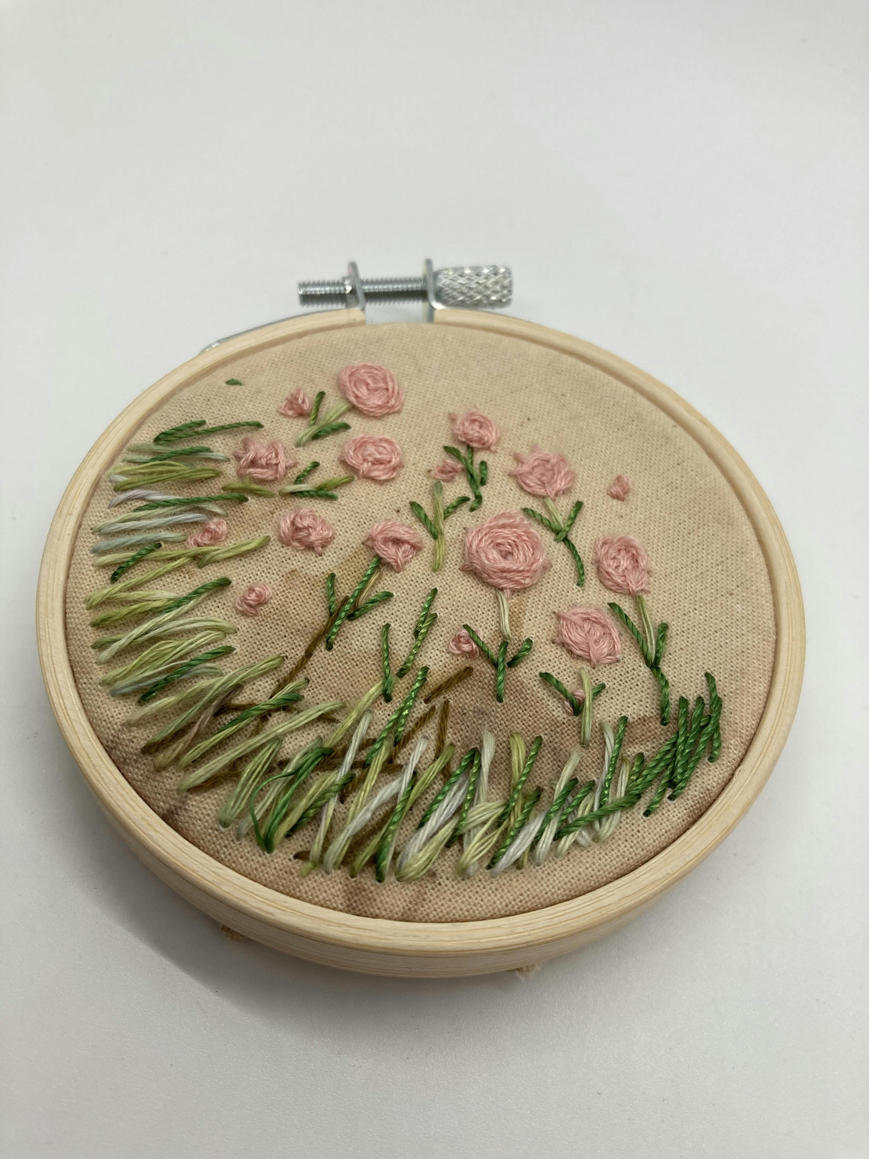 Embroidery of flowers in hoop