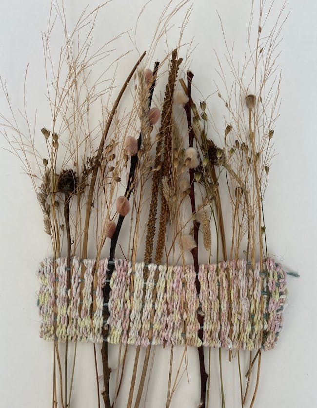 Weaving using flowers and grasses.