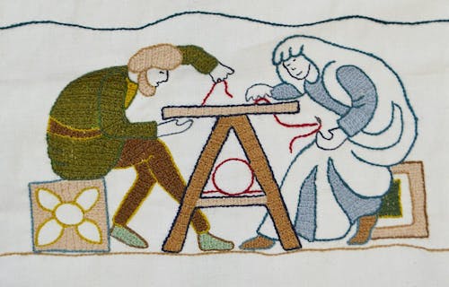 medieval style stitched picture of people sewing