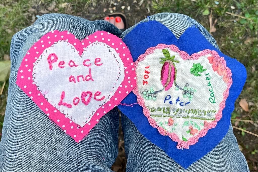 Embroidered hearts with writing on
