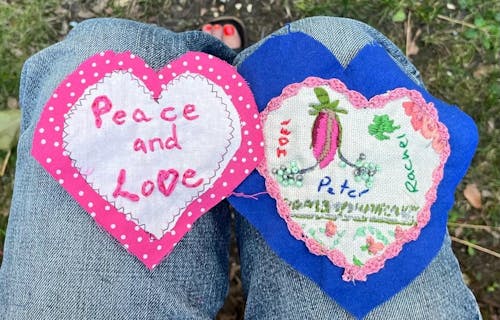 Embroidered hearts with writing on
