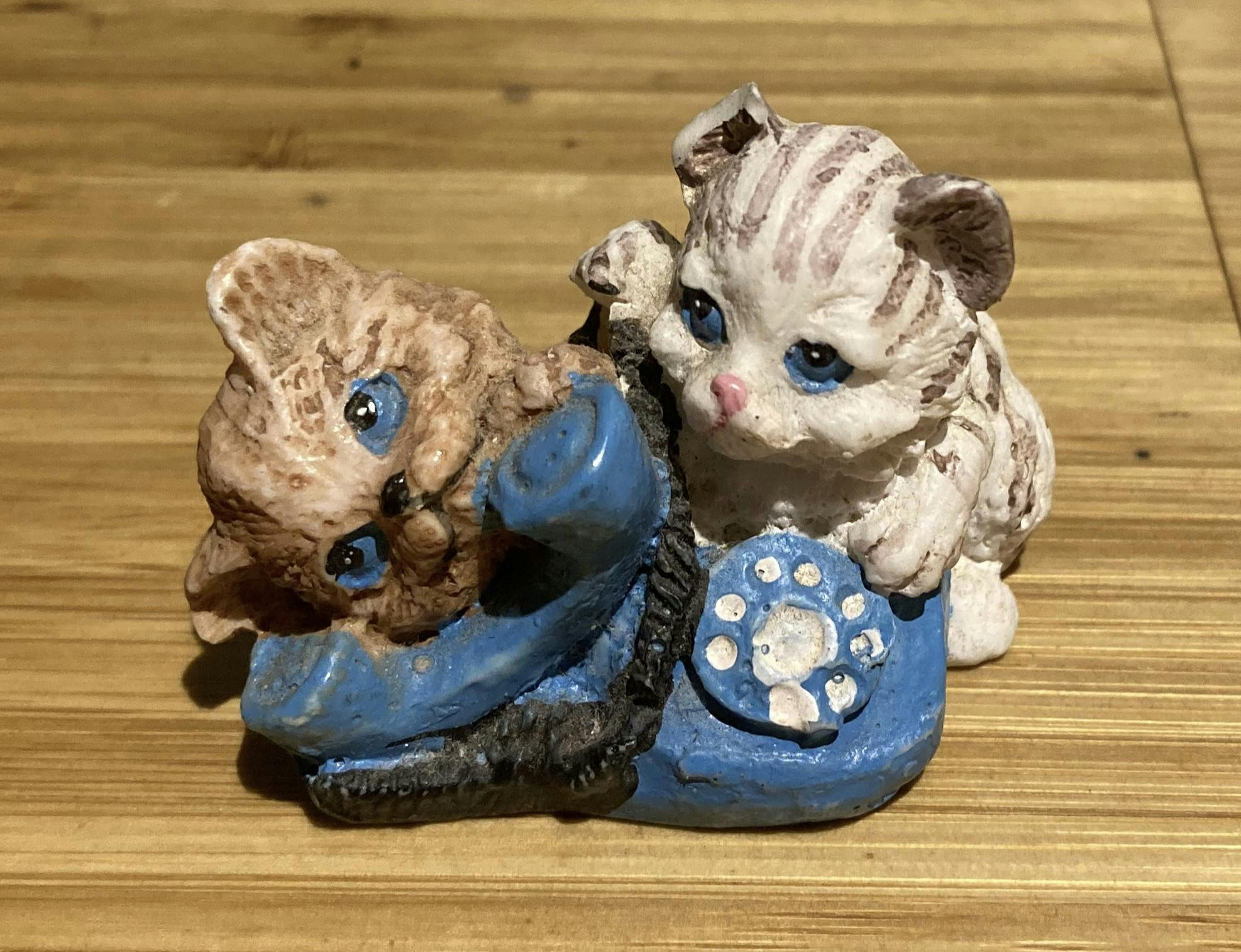 ceramic kittens on a phone painted