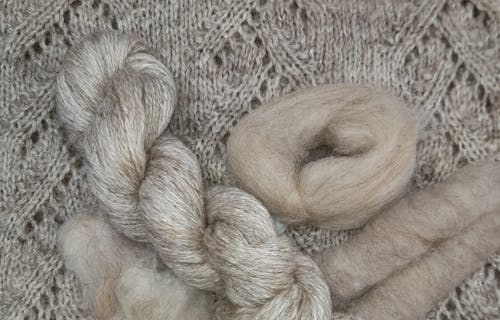 Beige yarn close up photo