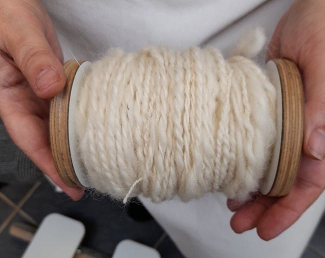 White yarn on bobbin