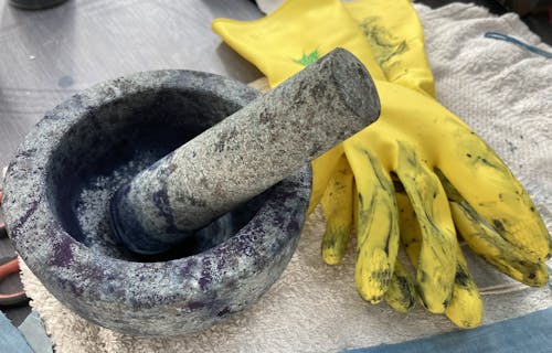 Pestle and mortar with rubber gloves