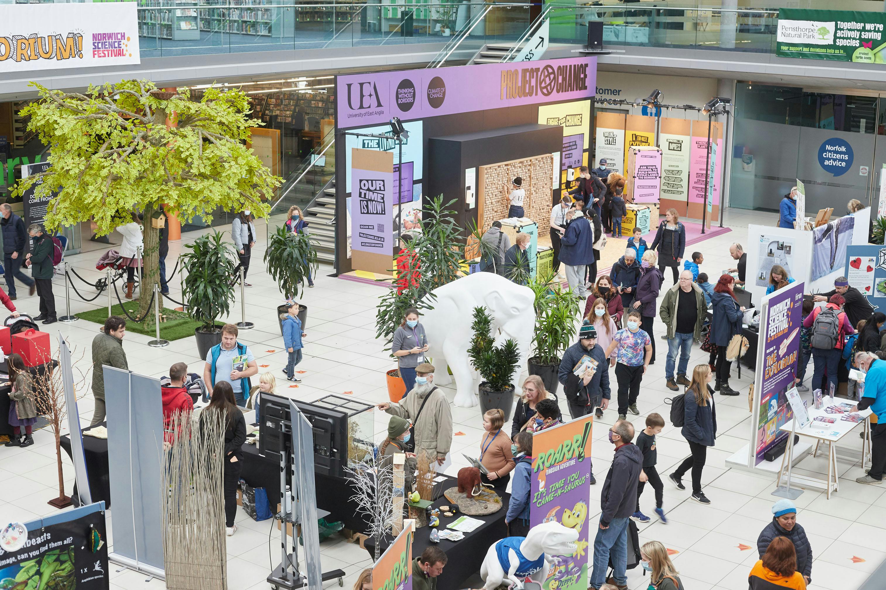 Crowds of visitors visit stands with fun activities at Norwich Science Festival 2021