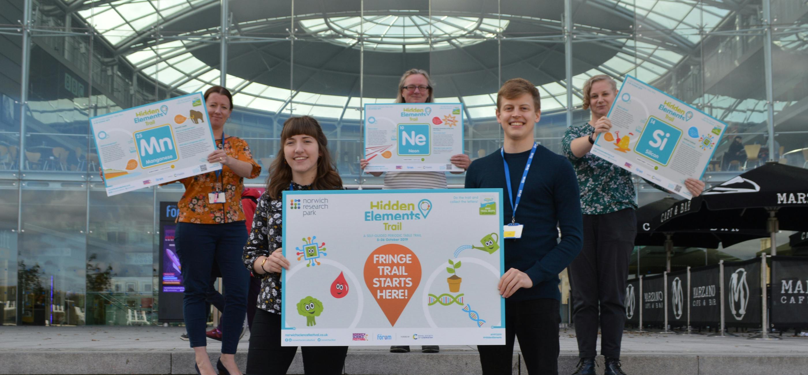 Hidden Elements trail launch at The Forum with interns Megan and Sam, front