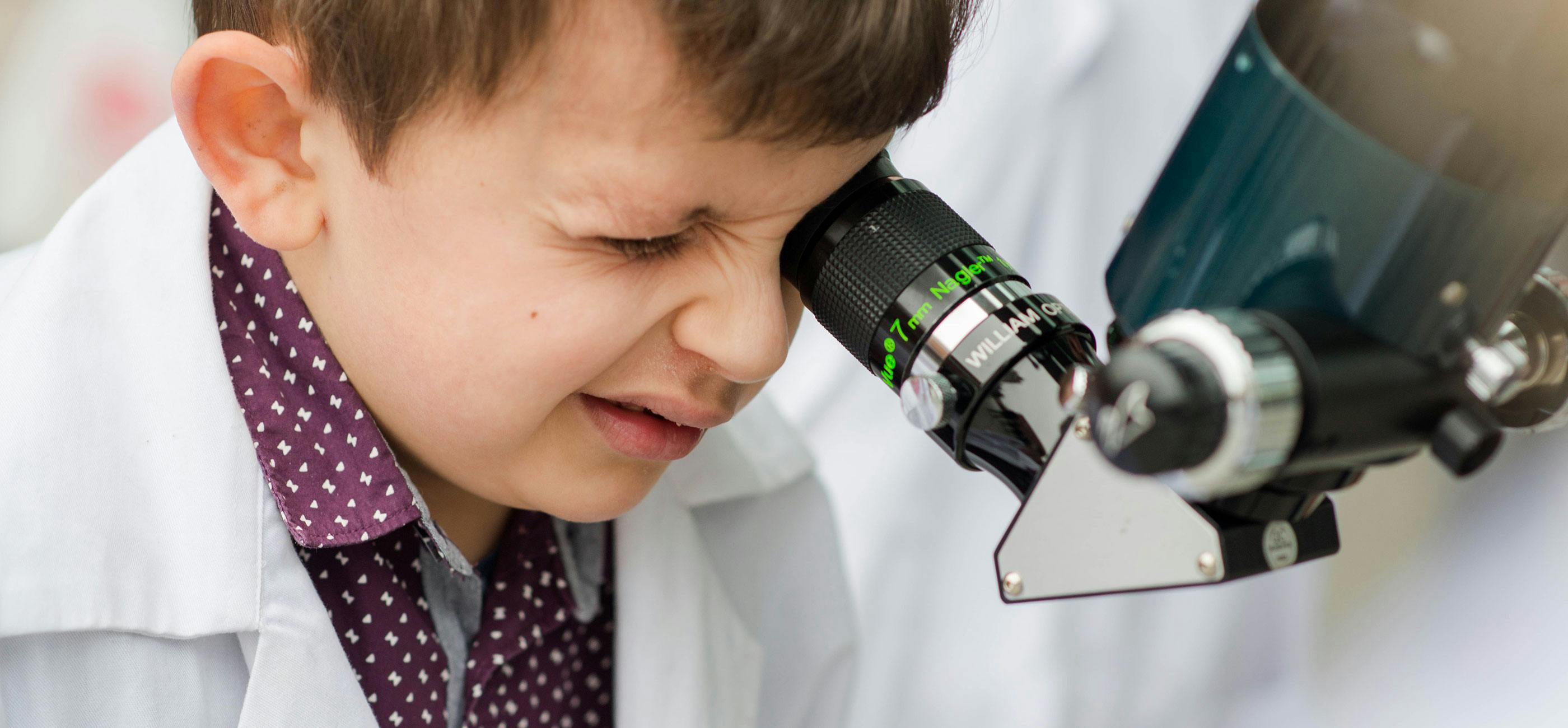 Boy with telescope - credit JMA Photography