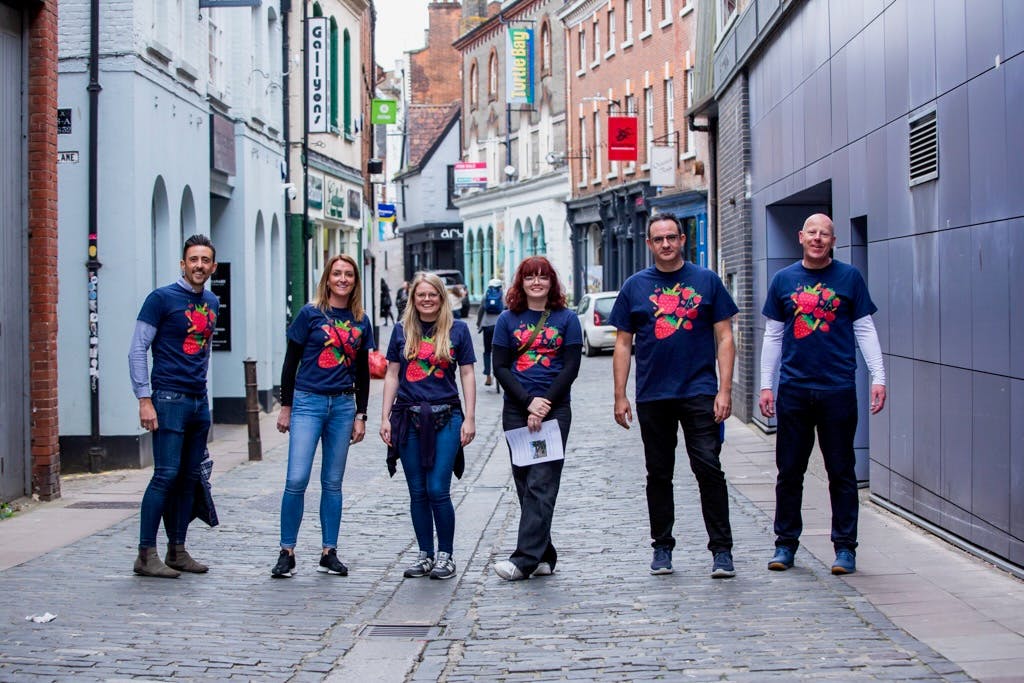The Feed team in strawberry T-shirts in Norwich Lanes