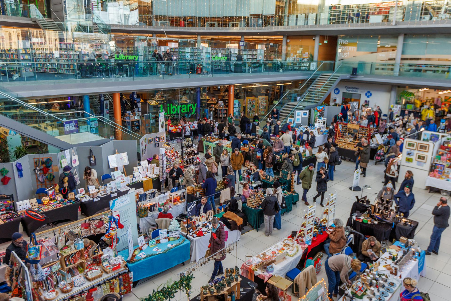 Busy Christmas market inside The Forum.