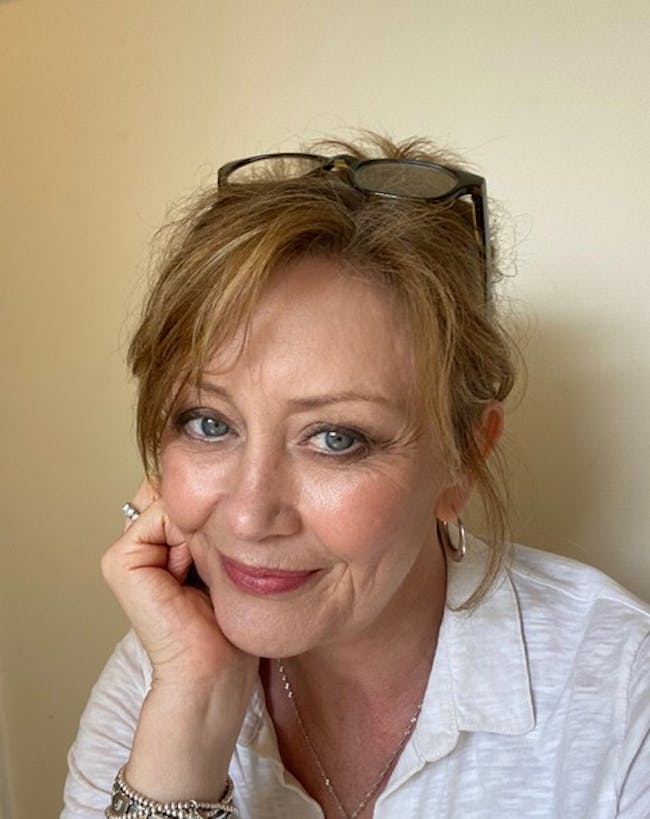 A side profile headshot of Jenny Knight