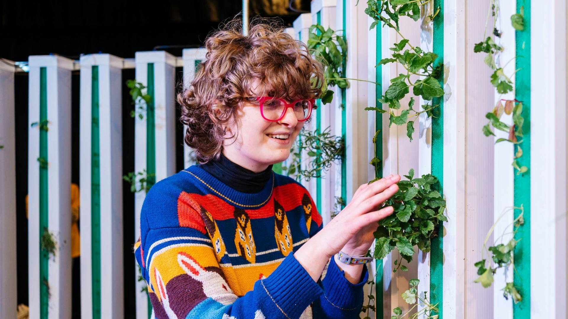 A visitor explores a vertical farm installation at Norwich Science Festival 2023