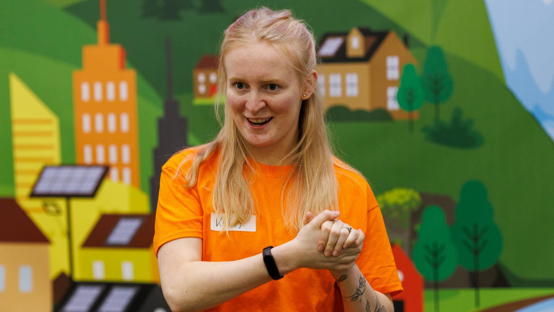 An Explainer at Norwich Science Festival delivers a workshop on electricity to a group of children