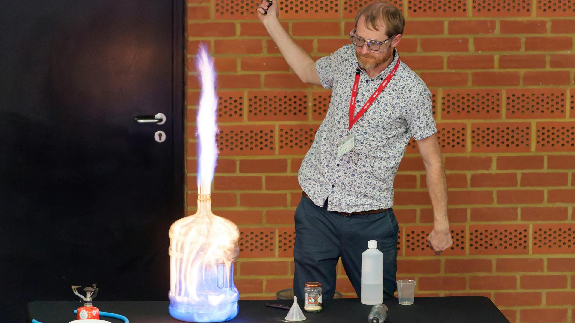 web-moon-to-mars.png Scott Marley lights the inside of a water jug on fire.