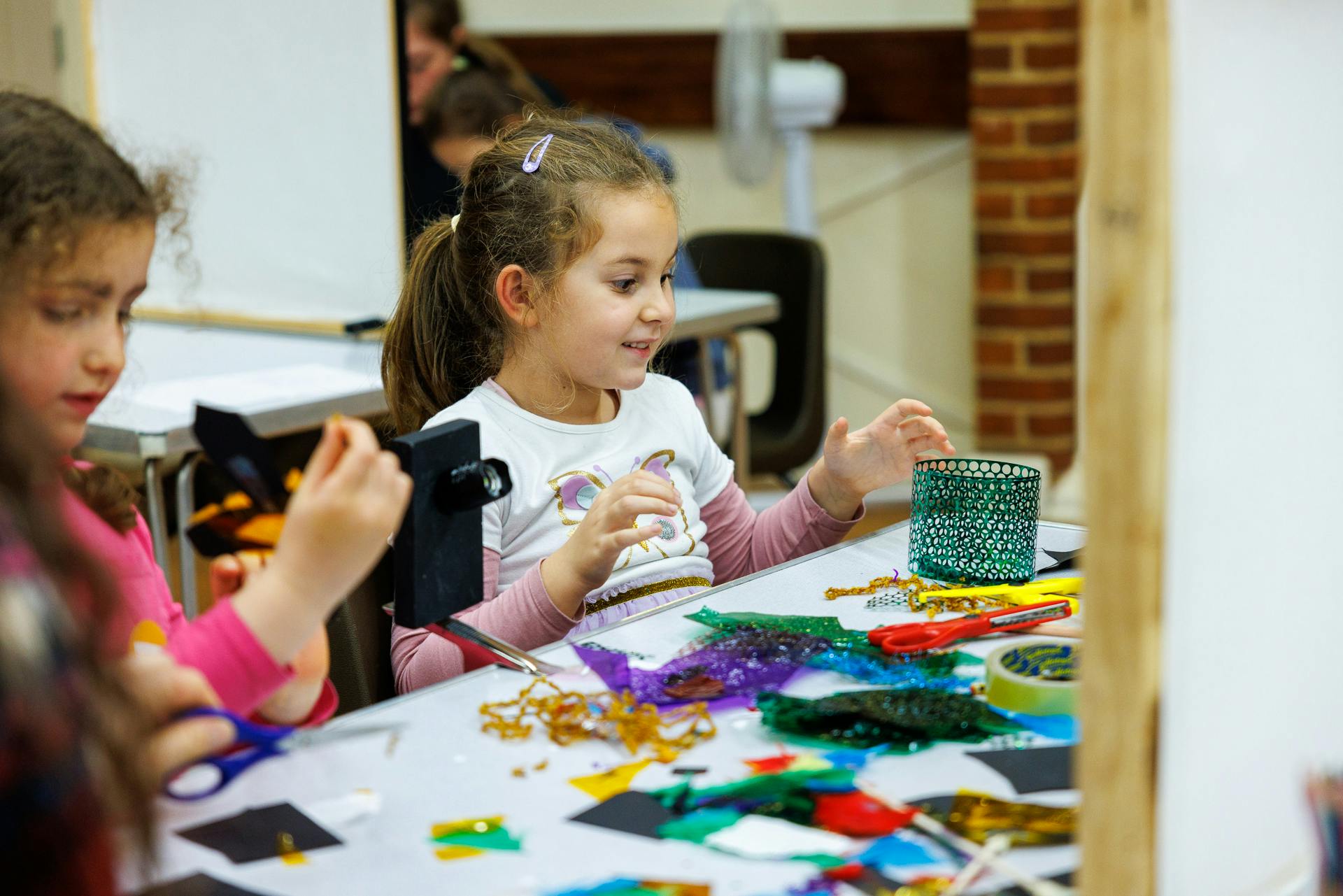 Children take part in a shadow puppet workshop