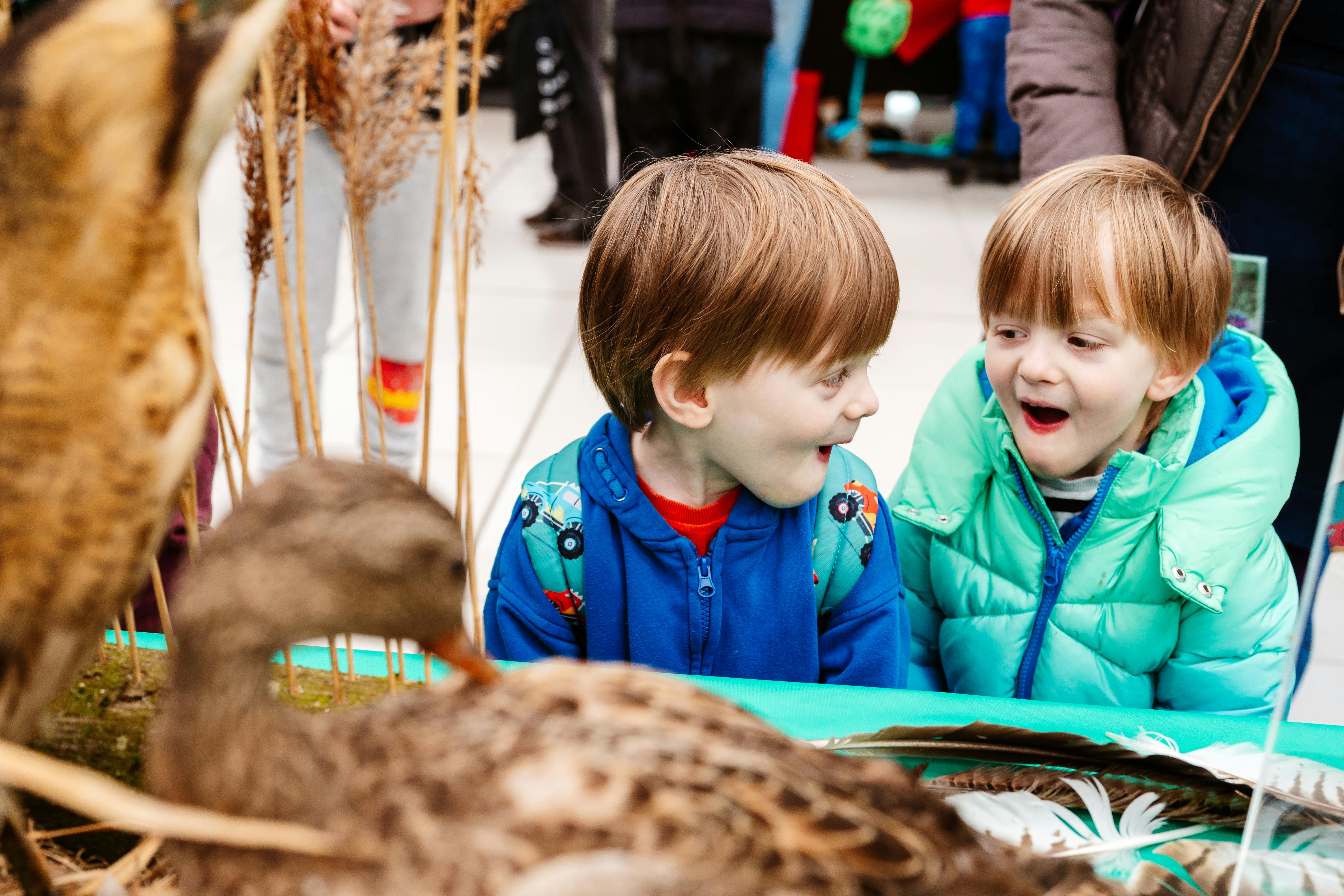 Two boys gasping with amazement.
