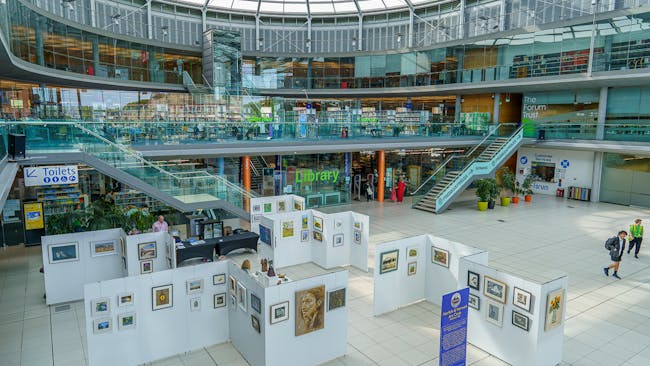 High view of the main Atrium with the Customer Service point in the far right corner.